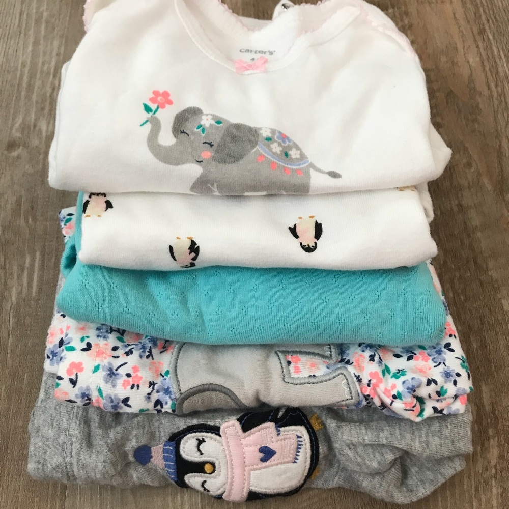 3 onesies and two pairs of pants.